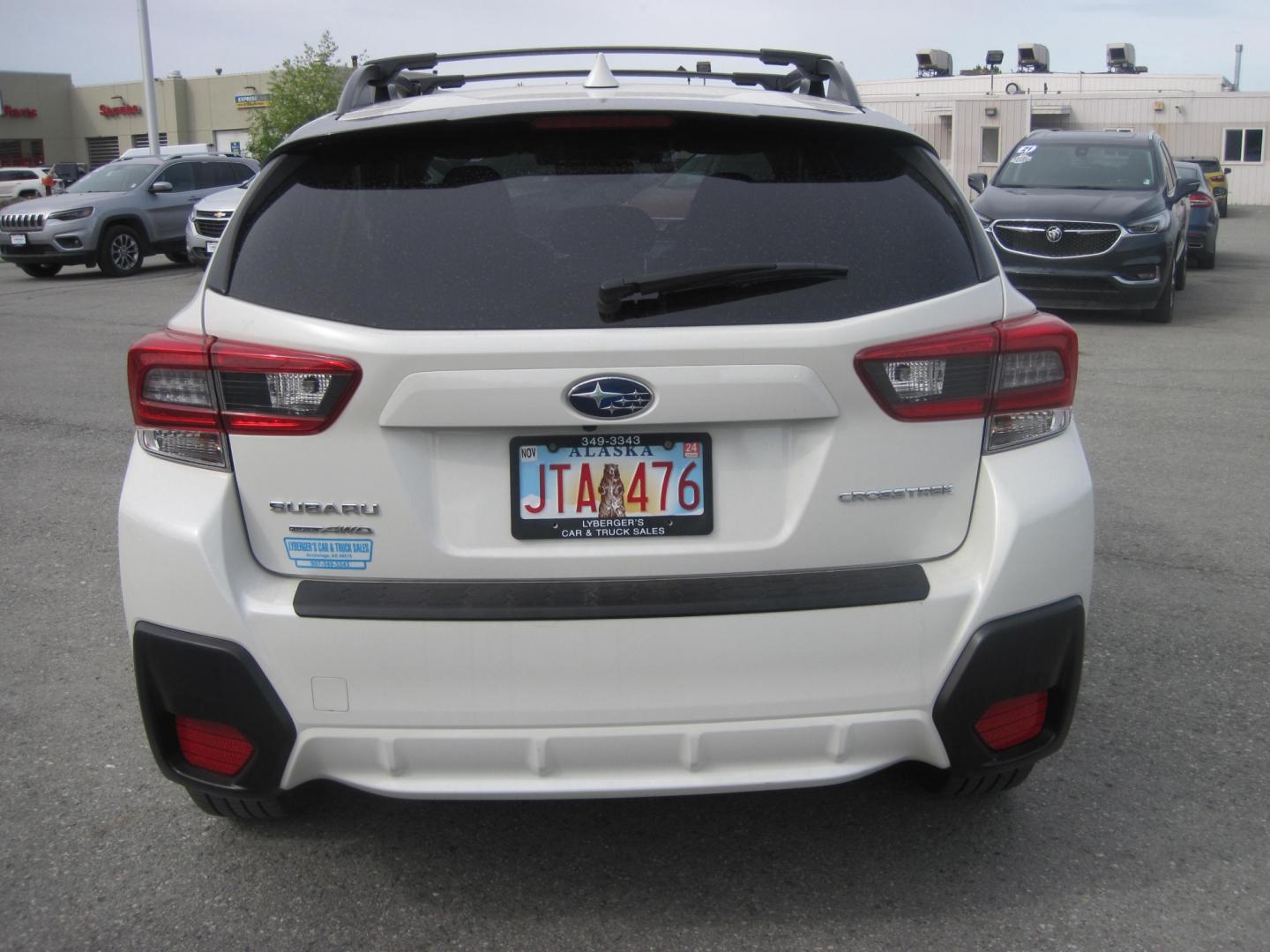 2021 white /black Subaru Crosstrek 2.0i Premium CVT (JF2GTAPC0M8) with an 2.0L L4 DOHC 16V engine, CVT transmission, located at 9530 Old Seward Highway, Anchorage, AK, 99515, (907) 349-3343, 61.134140, -149.865570 - Nice Subaru Crosstrek come take a test drive - Photo#3